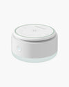 Momcozy Portable Baby Sound Machine - White and blue design, for baby sleep. Includes control buttons and brand logo.