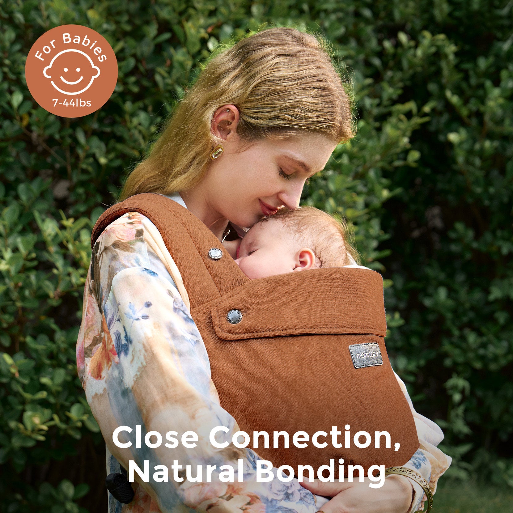 Momcozy GentleTouch baby carrier in brown, supporting close connection and natural bonding, suitable for babies 7-44lbs