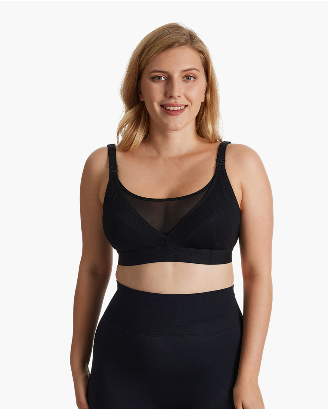 Woman wearing a black ultra-soft and cool breeze pumping and nursing bra HF018 by Momcozy, showcasing adjustable straps and comfortable design. New product badge displayed on top-right corner.