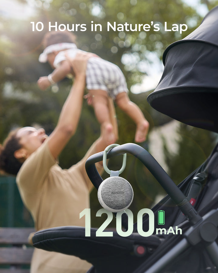 Momcozy sound machine providing nature sounds for baby sleep, attached to stroller, 1200mAh battery, up to 10 hours.