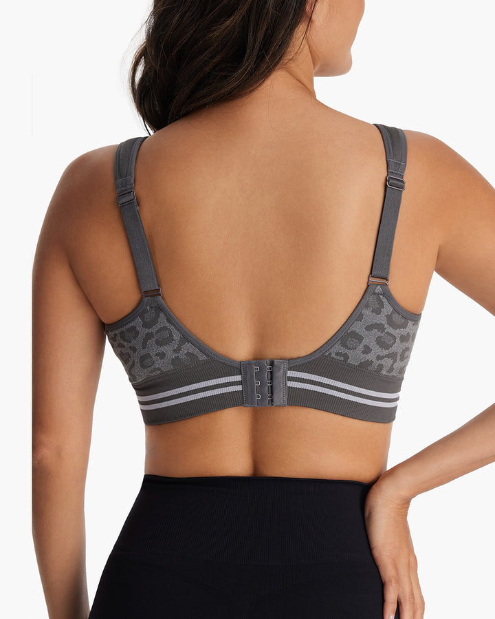 Back view of a woman wearing a grey leopard print HF022 4-in-1 hands-free seamless pumping bra, showcasing a comfortable fit.