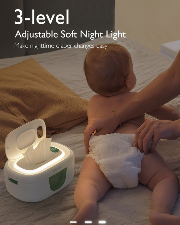 Adjustable soft night light and wipe warmer for easy nighttime diaper changes.