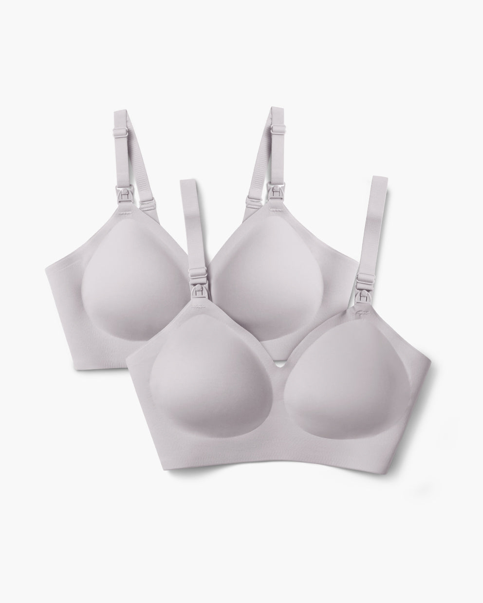 Two light grey Ultra Soft Seamless Nursing Bras YN21, showing smooth fabric, adjustable straps, and M5 pump clips.