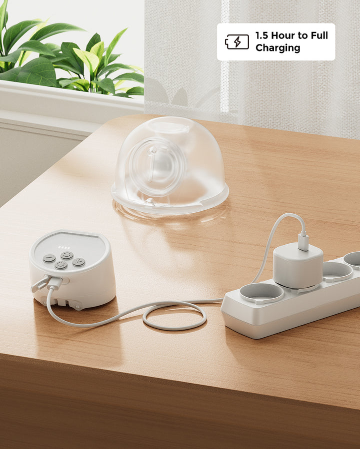 S12 Pro Wearable Breast Pump with charging dock and flange, featuring a long battery life that charges fully in 1.5 hours, ideal for busy moms.